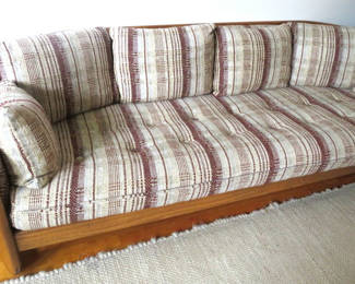 Lot 19: 1980s Vintage Howard Furniture Curved Barrel Spindle Sofa