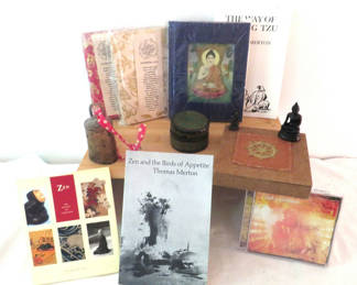 Lot 169: Zen Buddhist decorative display with Buddha statues, artwork, incense and books
