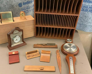 Lot 106: Assorted wooden desk clocks, organizers and carved boxes