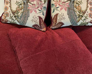 Lot 69: Burgundy velvet cushions with peacock tapestry pillows