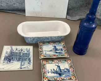 Lot 179: Blue Delftware Windmill Tiles with Glass Bottle and Speckled ceramic loaf pan