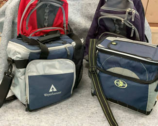 Lot 25: Two Rolling backpacks and 2 cooler bag