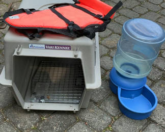 Lot 52: Pet supplies: dog crate, life jacket, water dispenser, and tent bed