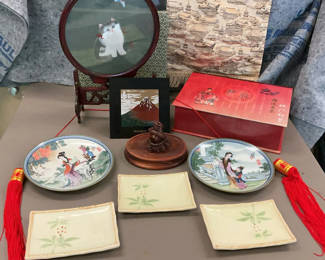 Lot 104: Assorted Chinese porcelain plates, teacups, and decorative display items