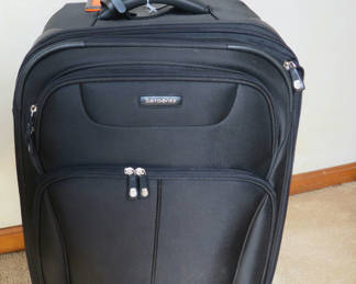 Lot 38: Black Samsonite Carry On Luggage Wheels and Handle