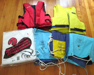 Lot 112: Boating lot of 2 Life jackets, 3 rafts, Buoyant cushion 