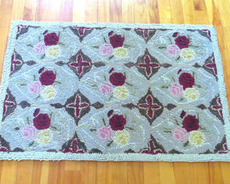 Lot 115: Dash and Albert Red Motifs Rug 2’ x 3’