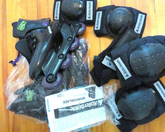 Lot 123: Pair of Roller Blade Boots with Blades and Pads