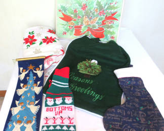 Lot 76: Grouping of Christmas Linens Tablecloth Placemats