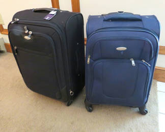 Lot 169: 2 Samsonite Medium Black & Navy Carry On Suitcases