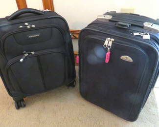 Lot 158: 2 Small Black Samsonite Carry On Suitcases