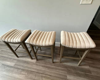 Lot 160: Three beige upholstered stools