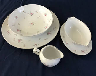 Lot 41: Floral ceramic dinnerware set with plates, bowl, creamer, and gravy boat