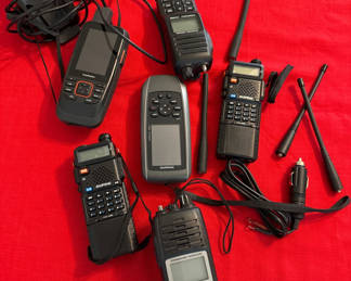 Lot 70: Handheld radios and GPS devices with accessories