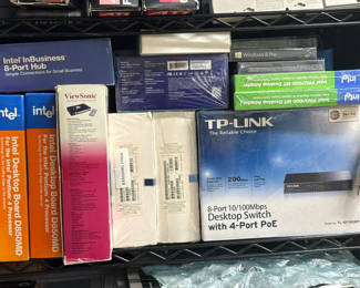 Lot 87: Assorted Networking and Surveillance Equipment Boxes