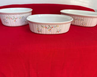 Lot 46: Corning Ware Three floral-patterned ceramic bowls