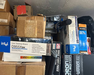 Lot 86: Stack of computer motherboard and PC hardware in boxes