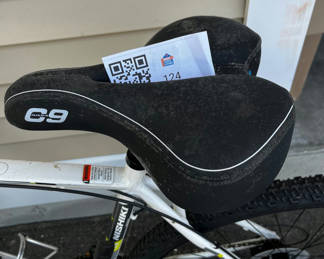 Lot 124: White Nishiki mountain bike with front suspension