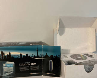 Lot 79: Navigon 5100 GPS Navigation System with Accessories