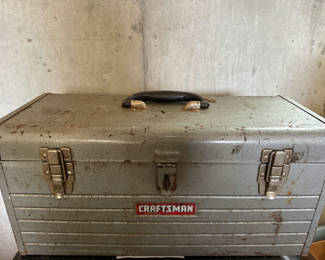 Lot 193: Craftsman metal tool chest with assorted hardware and hoses