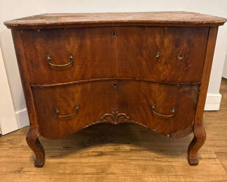 Lot 55: Vintage wooden chest of drawers with curved front