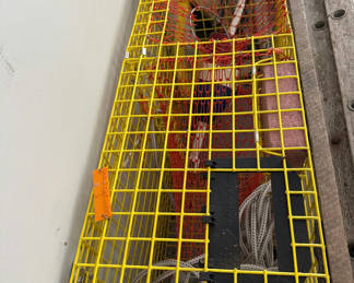 Lot 121: Fisherman’s Yellow wire-mesh cage with interior red netting