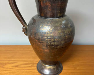 Lot 75: Antique metal pitcher with patina