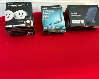 Lot 48: Smart Wi-Fi plugs, USB wireless adapter, and solar panel
