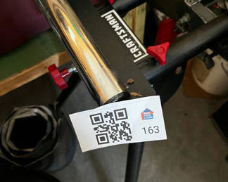 Lot 163: Adjustable chrome roller on a stand