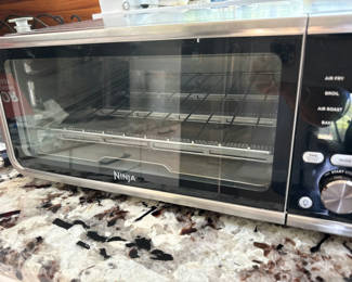 Lot 42: Ninja countertop oven with air fryer functions