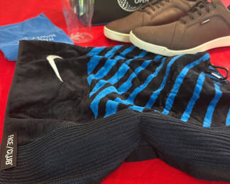 Lot 93: Brown Walter Hagen sneakers and athletic gear with bag