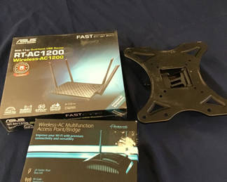 Lot 27: Boxed wireless router and access point with mounting plate