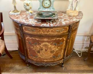 Marble top demilune chest