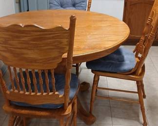 Oak Pedestal Dining Table and Spindle Back Chairs