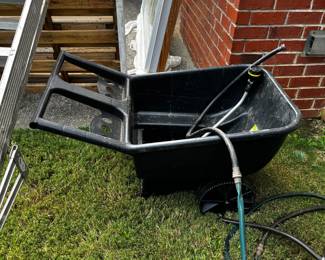 #080 Plastic Wheelbarrow Dump Cart $50.00