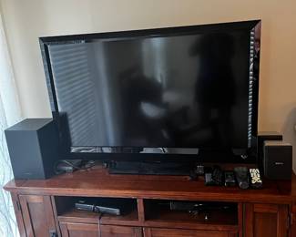 #009 Ashley Entertainment Center - 60x19x29 - w/4 doors and 2 open shelves $150.00