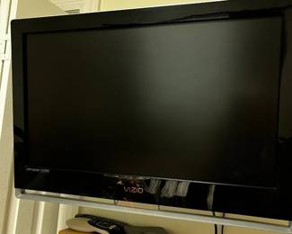 #056 Vizio TV w/Stand - 26" w/remote - You remove $25.00