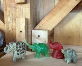 272 carvedstoneglassandredelephantfigu