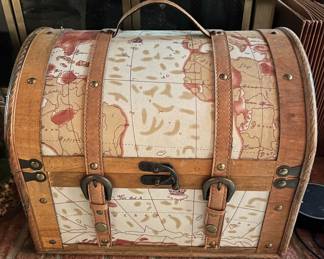 Antique-style wood and faux leather storage chest.