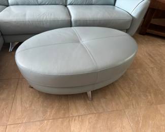 #12 - $1,400 -One of two sofa leather light blue Modena  101Lx 32Tx35W with ottoman 39Lx2'Wx15T - Looks brand new - (new $6,500)