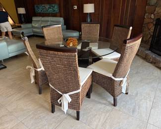 #9 -$400 -Round glass top table 54"x54" round with wood base  - slight damage on one leg & #10 - $450 -Set of 6 wicker cushion chairs 