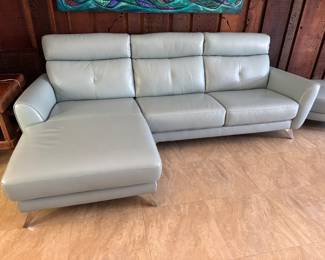 #12 - $1,400 -One of two sofa leather light blue Modena  101Lx 32Tx35W with ottoman 39Lx2'Wx15T - Looks brand new - (new $6,500)