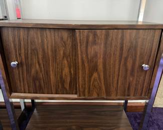 #23 - $1,450 - 1970's Three sectional walnut modular etagere designed by Milo Baughman with recessed lights 