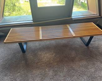 #31 - $1,000 - George Nelson slat bench / table is an early production by Herman Miller. Solid maple natural finish top and black wedge-shaped black legs - 6'L x 18 1/2 x 14 