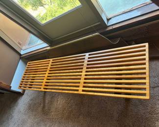 #31 - $1,000 - George Nelson slat bench / table is an early production by Herman Miller. Solid maple natural finish top and black wedge-shaped black legs - 6'L x 18 1/2 x 14 