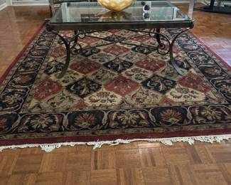 RUG & GLASS TOP COFFEE TABLE - METAL BASE OF TABLE