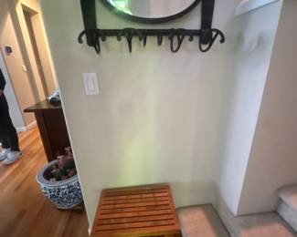 Wall mirror with coat hooks