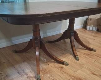Double Pedestal Regency Style Brass Footed Wood Table