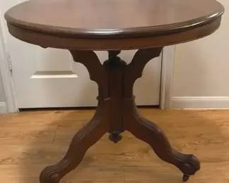 Vintage Round Pedestal Accent Table with Carved Tripod Base on wheels 32 Diameter x 29.5 H