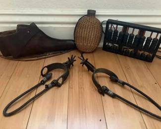 SU244Antique Iron Spurs more